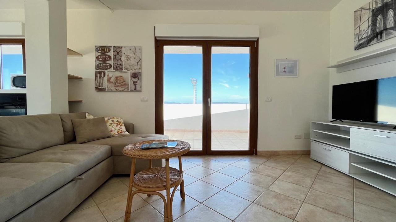 Апартаменты Attici Con Terrazzo Vista Mare Калазетта Экстерьер фото